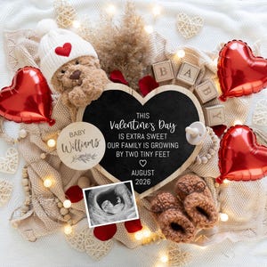 May include: A Valentine's Day announcement with a teddy bear wearing a white hat with a red heart. Includes red heart balloons, baby booties, and a chalkboard heart with text: "THIS Valentine's Day IS EXTRA SWEET...AUGUST 2026."