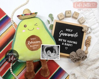 May include: A plush avocado toy wearing a sombrero, with a baby announcement on a letter board that reads "Holy Guacamole We're Having A Baby!"
