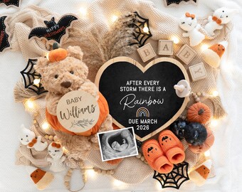May include: A Halloween-themed baby announcement with a teddy bear in a pumpkin costume, a heart-shaped chalkboard with text, and baby booties. The announcement includes the text "AFTER EVERY STORM THERE IS A Rainbow DUE MARCH 2026".