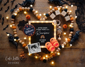 May include: A Halloween-themed baby announcement with a heart-shaped garland of orange and brown felt balls, black bats, and white lights. A letter board reads "After every storm there is a rainbow" with the date "October 2024". A small ultrasound image is in the lower left corner. A small wooden sign reads "Baby Williams".