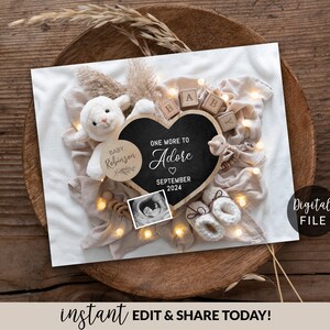 May include: A digital printable announcement for a baby's arrival. The announcement features a heart-shaped chalkboard with the text "One More to Adore" and the month "September" and year "2024". The chalkboard is surrounded by a white blanket, a stuffed lamb, wooden blocks that spell "BABY", and a string of fairy lights.