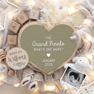 May include: A heart-shaped announcement board with the text "THE Grand Finale WHAT'S ONE MORE?" and "JANUARY 2026". The image includes wooden blocks, baby shoes, a stuffed animal, and a sonogram. The announcement is for Baby #3 Williams.