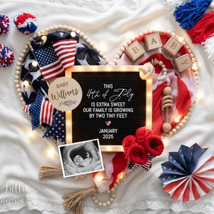 May include: A red, white, and blue themed baby announcement with a chalkboard sign that reads "This 4th of July is extra sweet our family is growing by two tiny feet. January 2025".