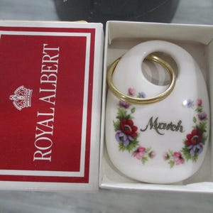 Vintage Royal Albert Porcelain Key Fob/Chain Flower of the month March. England. Original box.