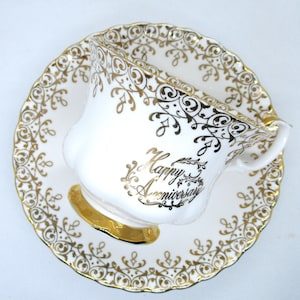 Vintage Royal Albert Happy Anniversary Teacup and Saucer. Bone China. England