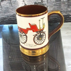 Vintage bierpul met auto. Engeland