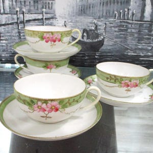 Vintage set of 4 Hand Painted Nippon Teacups and Saucers. Japan