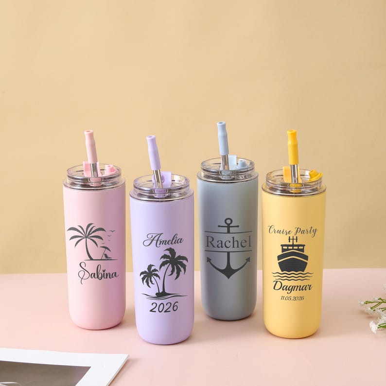 May include: Four personalized stainless steel tumblers with straws. The tumblers are pastel pink, lavender, gray, and yellow. Each tumbler has a different design, including palm trees, an anchor, and a cruise ship, along with custom text.