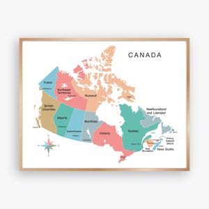 May include: A framed map of Canada, featuring provinces and territories in various colors. The map includes labels for each region, with the word "CANADA" at the top. A compass rose is in the lower left corner.