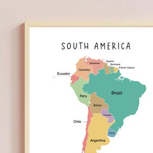 May include: A colorful map of South America with the names of each country labeled. The map is on a white background with a light wood frame.