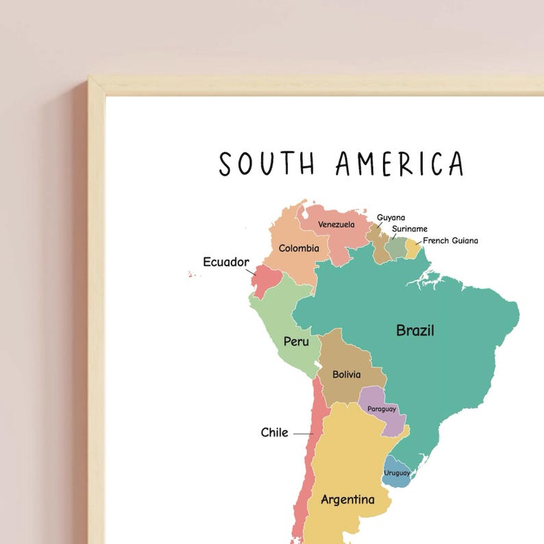May include: A colorful map of South America with the names of each country labeled. The map is on a white background with a light wood frame.