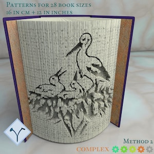 Pode incluir: Um projeto de arte de livro com um design complexo de pássaros em um ninho. O livro é dobrado para criar um efeito 3D. O texto no livro diz "Padrões para 28 tamanhos de livros 16 cm + 12 polegadas Método 2 Complexo".