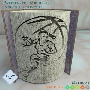 May include: A complex papercraft model of a basketball player, made from folded pages of a book. The model is 40.6 cm tall and 30.5 cm wide. The model is made using method 2.