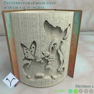 May include: A book folding pattern for a deer and butterfly design. The pattern is for 28 book sizes, 16 in cm and 12 in inches. The pattern is labeled "Method 2, Basic".