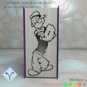 May include: A book with a carved design of Popeye the Sailor. The book has a purple spine and the text "PATTERNS FOR 28 BOOK SIZES 16 IN CM + 12 IN INCHES" is visible. The word "COMPLEX" and "METHOD 4" are also visible.