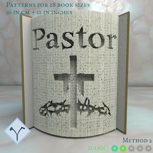 Puede incluir: Un libro abierto con la palabra "Pastor" tallada en las páginas, con una cruz y una corona de espinas. El texto "PATTERNS FOR 28 BOOK SIZES 16 IN CM + 12 IN INCHES" es visible. El diseño del libro es intrincado.