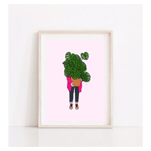 cheese plant // Monstera // Pink // Orange // Figure carrying monster plant baby //