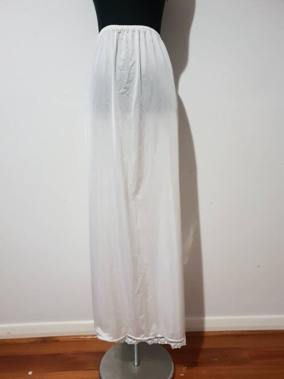 white floor length slip dress