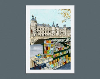May include: A watercolor illustration of a Parisian street scene with a book stand selling books and magazines. The stand is located on the Seine River with a bridge in the background. The Conciergerie, a historic building, is visible in the distance.