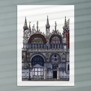 May include: A detailed black and white illustration of a large, ornate building with multiple towers and arches. The building has a gray stone facade with intricate details and a red roof.