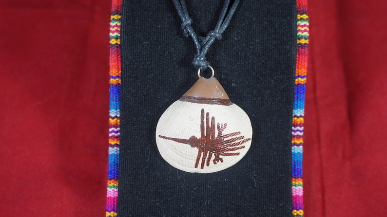 marina concha with design Line Nazca Condor Peruvian necklace