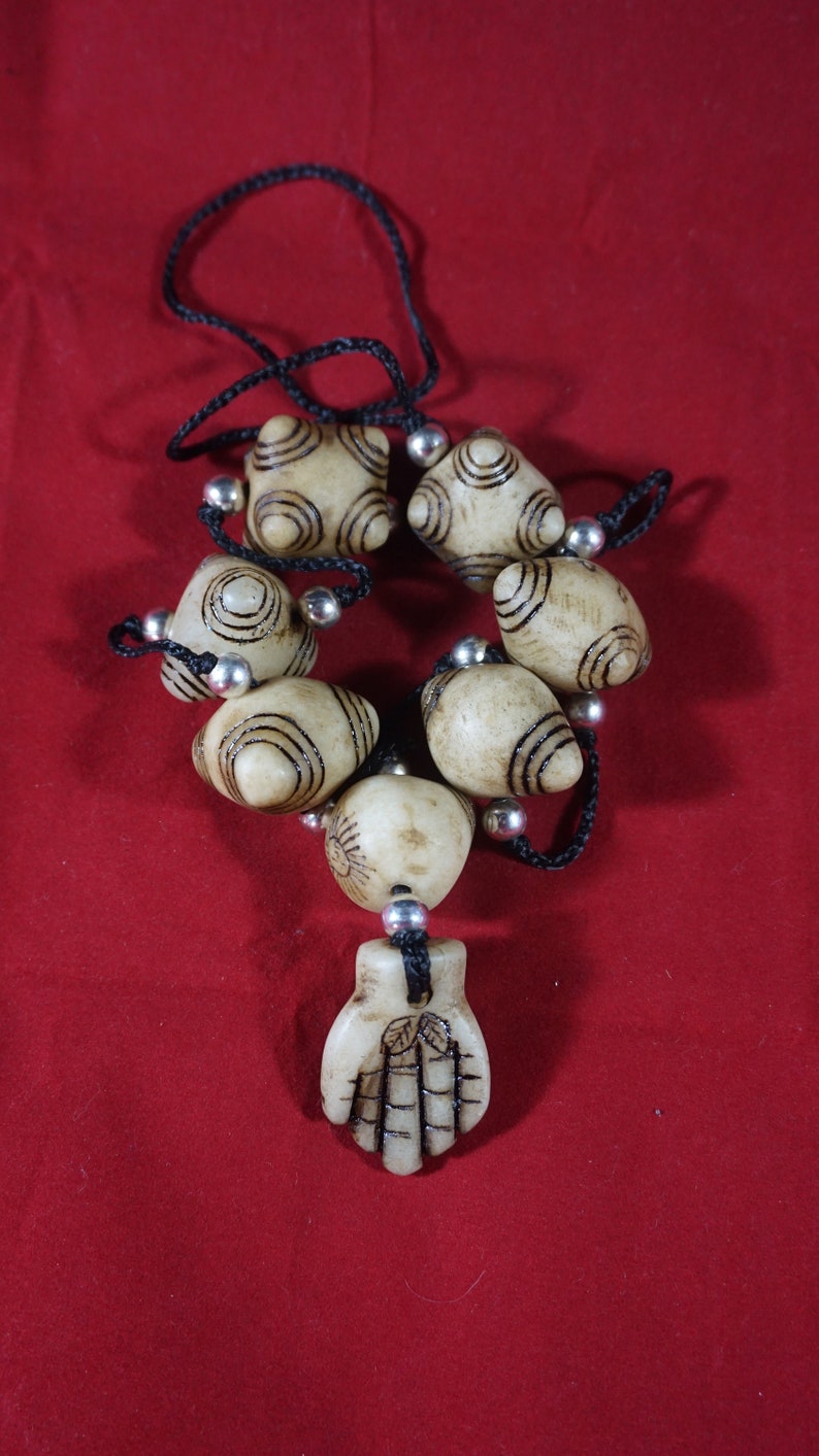carved in stone Shaman/'s necklace chumpi and offering of hand