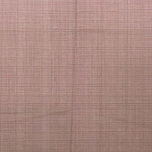 May include: Close-up of a fabric with a grid pattern. The fabric has a dusty rose color with a subtle, lighter grid overlay. The texture appears to be woven, with a slightly rough surface.