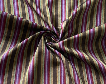 Shiny colorful silk and cotton woven Turkish kutnu fabric by the yard.