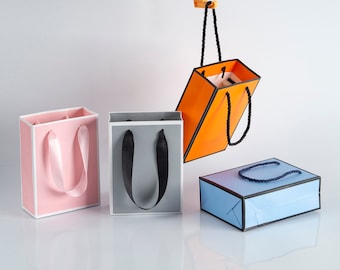 100 bolsas de regalo de papel kraft con asas: bolsas para regalos de fiesta