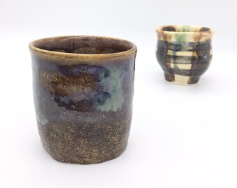 Decorative mini pot with blue and brown glaze and letter detailing
