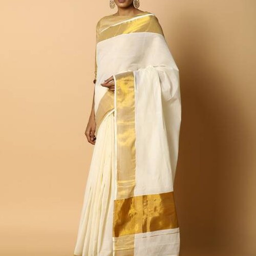 off white color saree with golden border