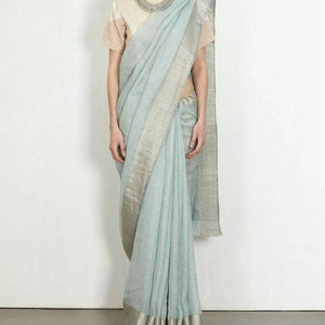 Light blue linen saree,Linen by linen 100 count light blue pure organic handwoven saree with silver zari border,Linen saree,Partywear saree