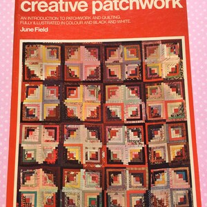 May include: A red book titled "creative patchwork" with the subtitle "An introduction to patchwork and quilting. Fully illustrated in colour and black and white." by June Field. The cover features a colourful patchwork quilt design.