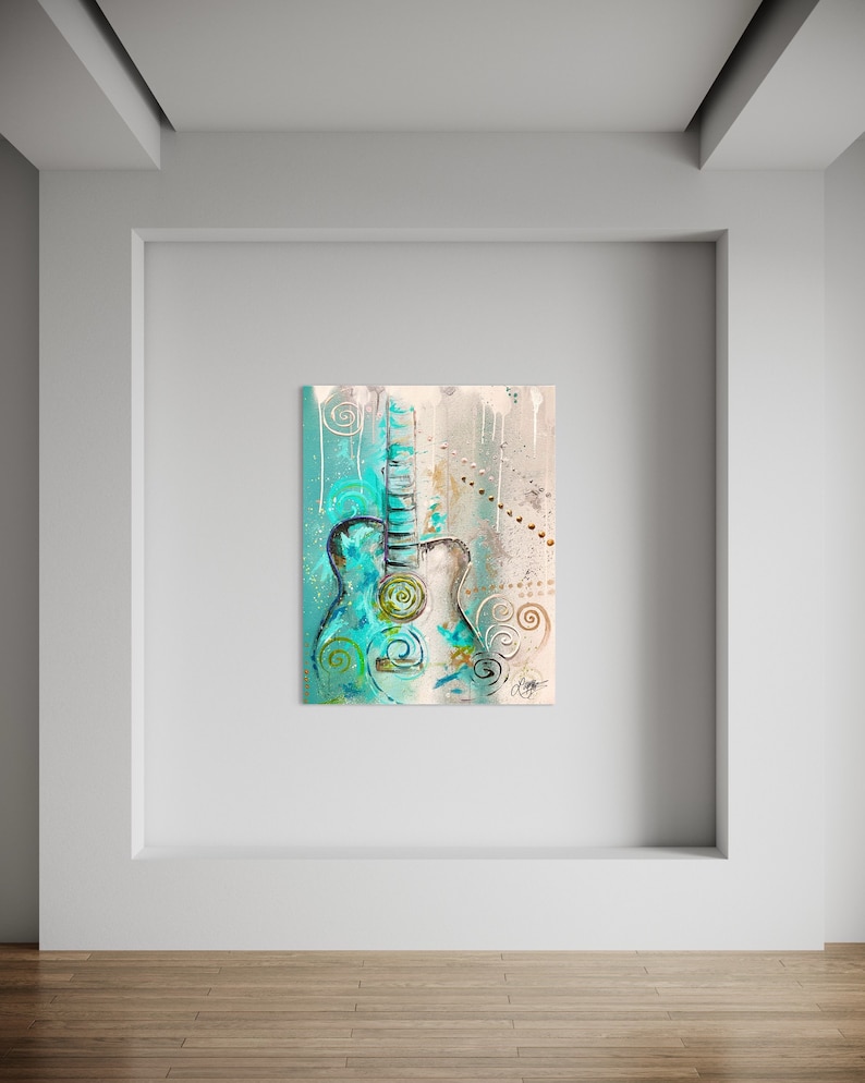 May include: Abstract painting of a teal blue acoustic guitar with gold and white accents. The guitar is surrounded by swirls and dots. The background is a light beige color.