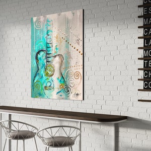 May include: Abstract painting of a teal and white guitar with swirls and dots on a beige background.