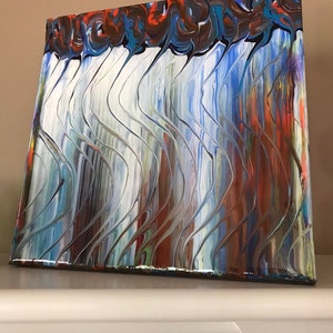 May include: Abstract painting on canvas with a white background and blue, brown, and red swirling patterns.