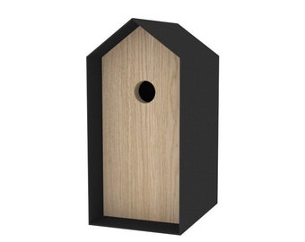 May include: A black and wood birdhouse with a round opening. The birdhouse is shaped like a house with a peaked roof.