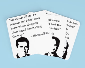 May include: Four white cards with black text and images. The cards feature quotes from the character Michael Scott from the TV show "The Office". One card reads, "Sometimes I'll start a sentence and I don't even know where it's going. I just hope I find it along the way." - Michael Scott