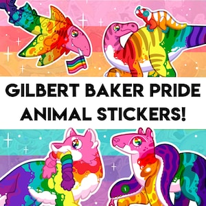 May include: Colorful animal stickers with rainbow designs and the text "GILBERT BAKER PRIDE ANIMAL STICKERS!". The stickers feature a shark, dinosaur, wolf, and snake, each with vibrant rainbow patterns and pride flags.