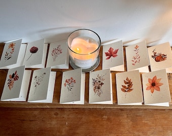 12 cute, mini lavender seeded cards with individual autumnal botanicals on each card