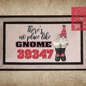 May include: A doormat with a gnome design and the text "There's no place like GNOME 39347". The gnome is wearing a red hat and has a white beard. The doormat is brown and has a burlap texture.