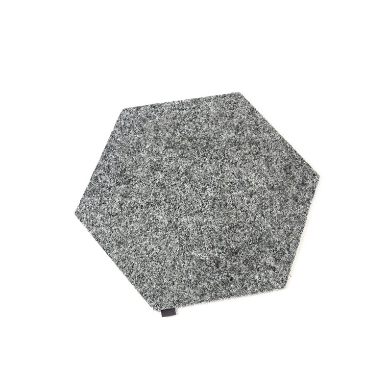 May include: A gray hexagonal rug with a fuzzy texture.