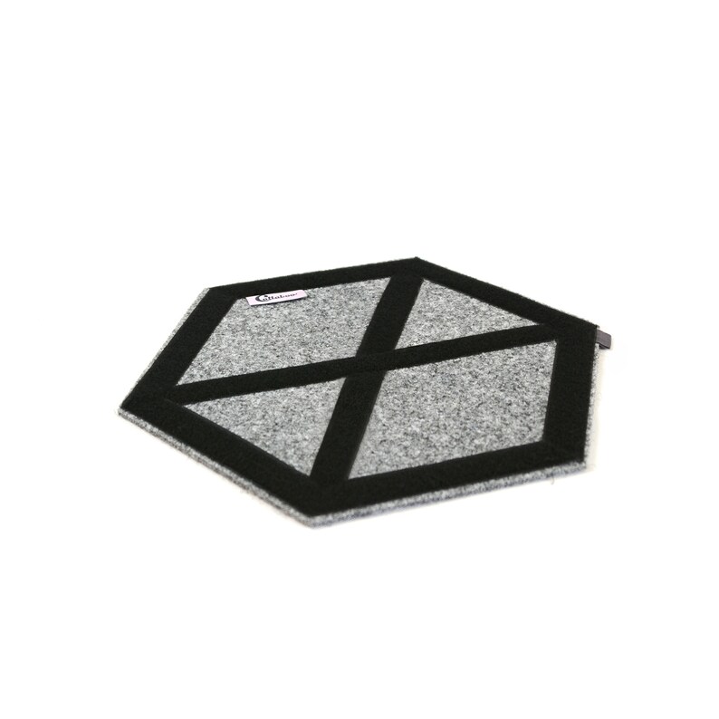 May include: A gray hexagonal floor mat with a black border and a black X design. The mat has the word "Callaway" printed on it.