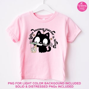 May include: Pink t-shirt with a black cat graphic holding a knife and a cup of iced coffee. The text "Coffee because murder is wrong" is written around the cat.
