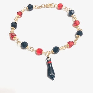 Spanish bracelet with black fist best sale