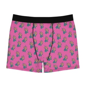 May include: Pink boxer shorts with a repeating pattern of a couple riding a seahorse.