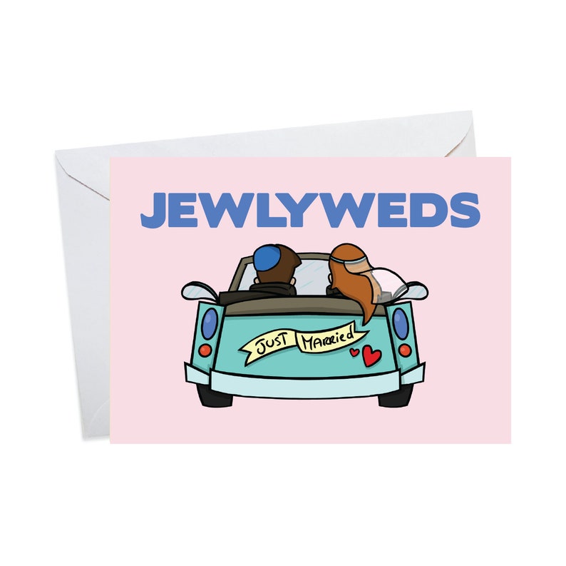 May include: A pink card with the text "JEWLYWEDS" in blue letters. A cartoon image of a blue car with a couple inside, driving away with a "Just Married" sign on the back.