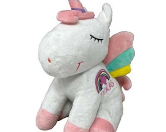 Plüsch Einhorn von Texas mit TEXAS auf der Vorderseite gestickt.