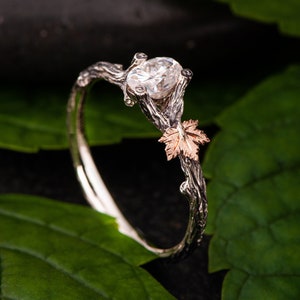 Zweig und Ahornblatt Oval Diamant-Verlobungsring
