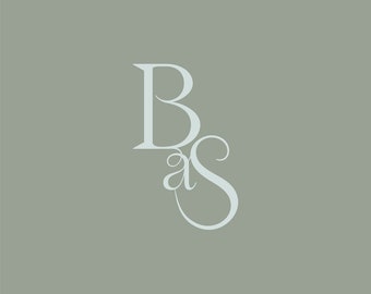 May include: A stylized logo with the letters "B" and "as" intertwined. The "B" is in a serif font and the "as" is in a cursive font.